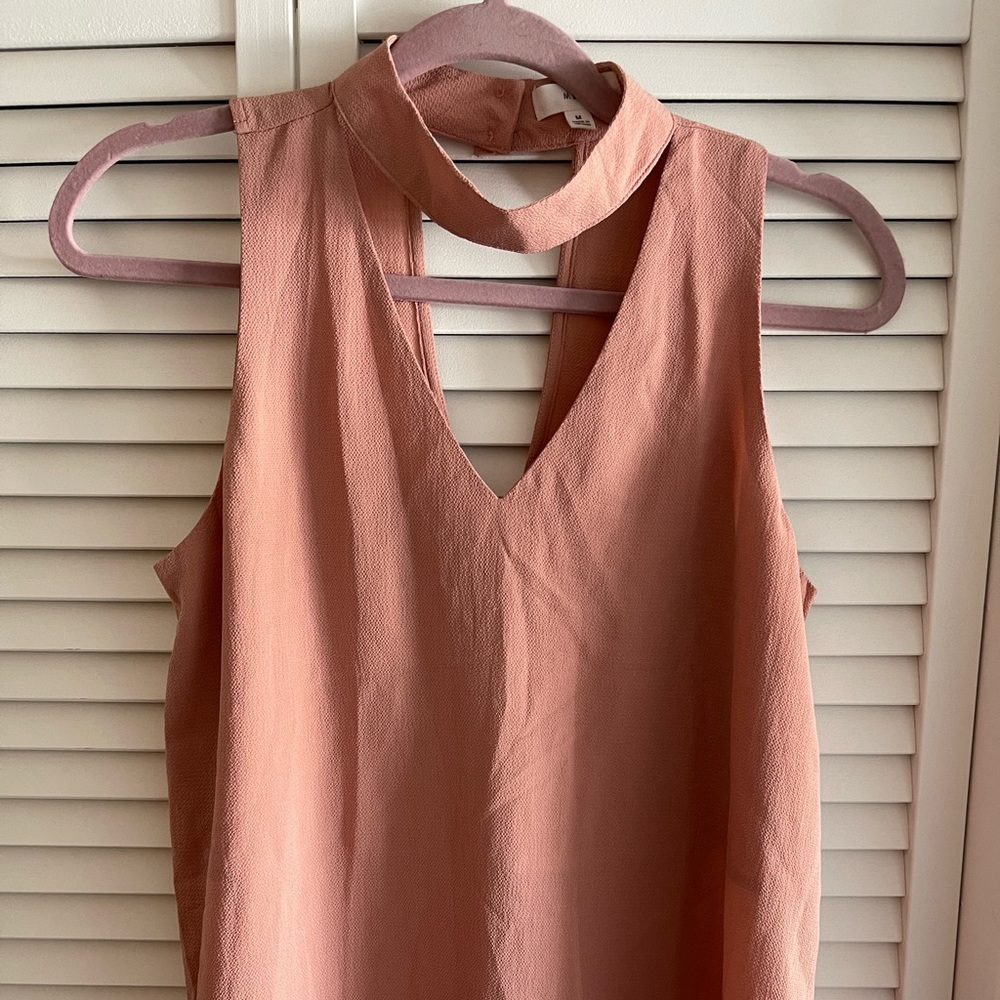 Open chest float haulter-top with button closure at neck